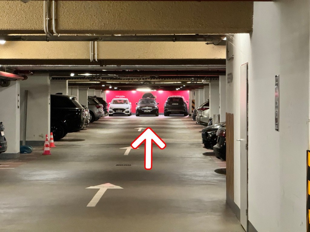 Walk straight to the end of the parking area