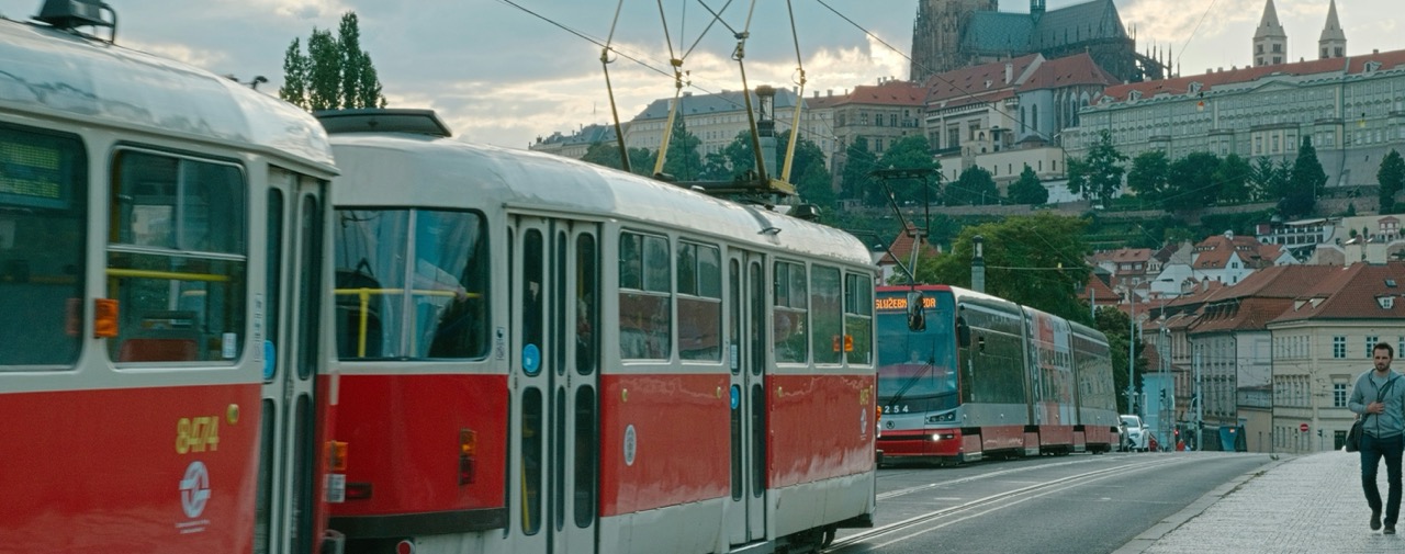 Tram tracks crossing a cobbled street in central Prague