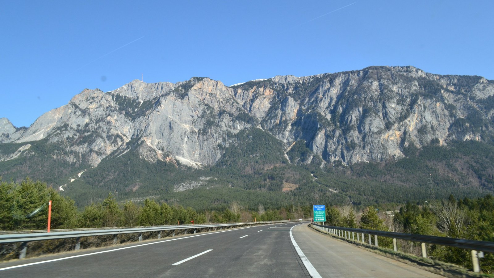 Motorway leading toward a mountain range